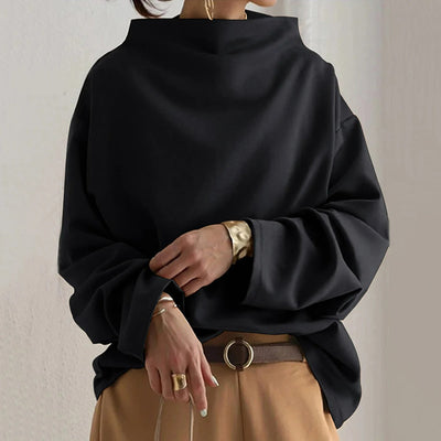 ELENA, elegante jersey de manga larga.