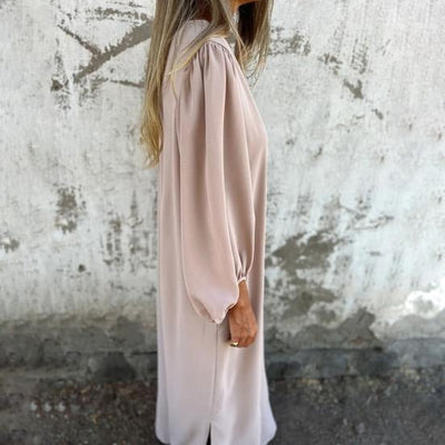 OLGA|Vestido largo fluido con escote en V y mangas abullonadas .