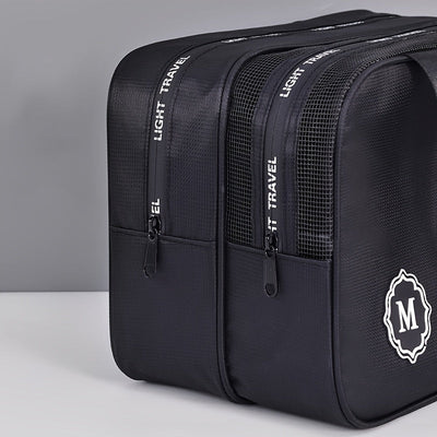 Neceser de viaje con compartimentos múltiples para mujer.