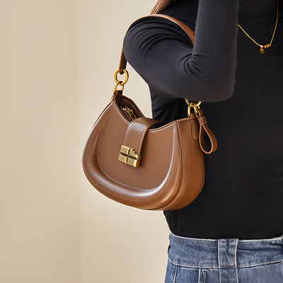 Bolso de Hombro Elegante con Cierre Dorado y Forma Semicircular