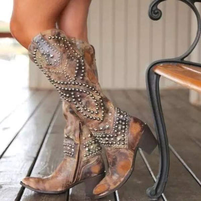 Botas altas hasta la rodilla. Encantadoras.