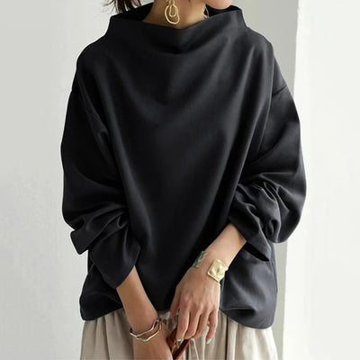 ELENA, elegante jersey de manga larga.