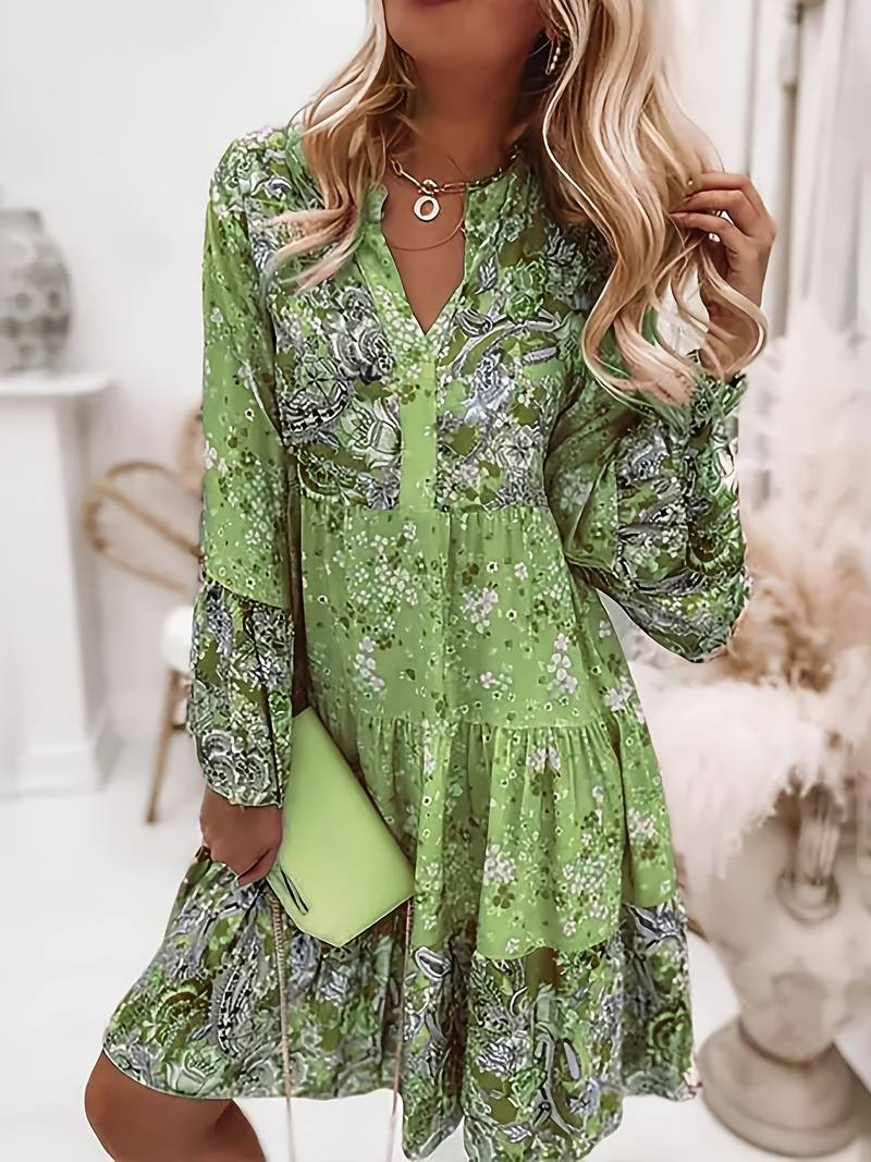 ALBA| Vestido floral, manga larga y un comodo corte holgado.