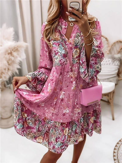 ALBA| Vestido floral, manga larga y un comodo corte holgado.