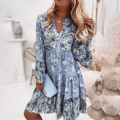 ALBA| Vestido floral, manga larga y un comodo corte holgado.