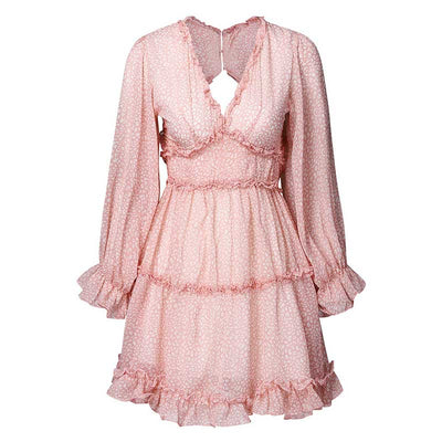 LOLA| Vestido de estilo boho con volantes y estampado floral.