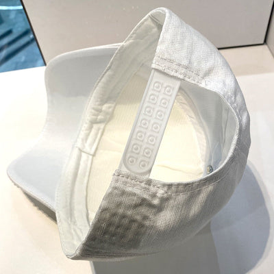 Gorra superbrillante.