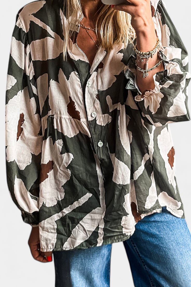 LARA| Blusa con Media Botonadura y Manga Abullonada en Estampado Floral Abstracto