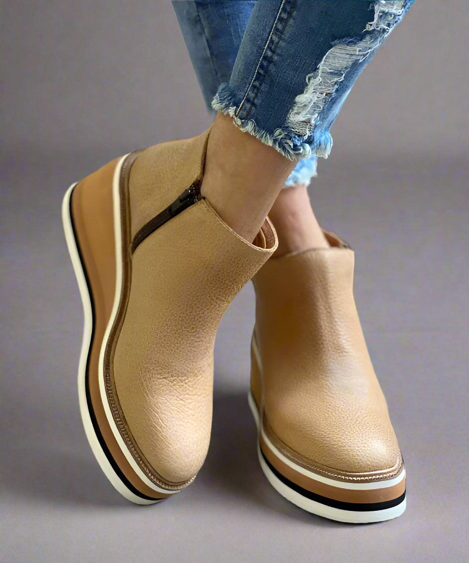 Santi | Botines elegantes y ligeros.