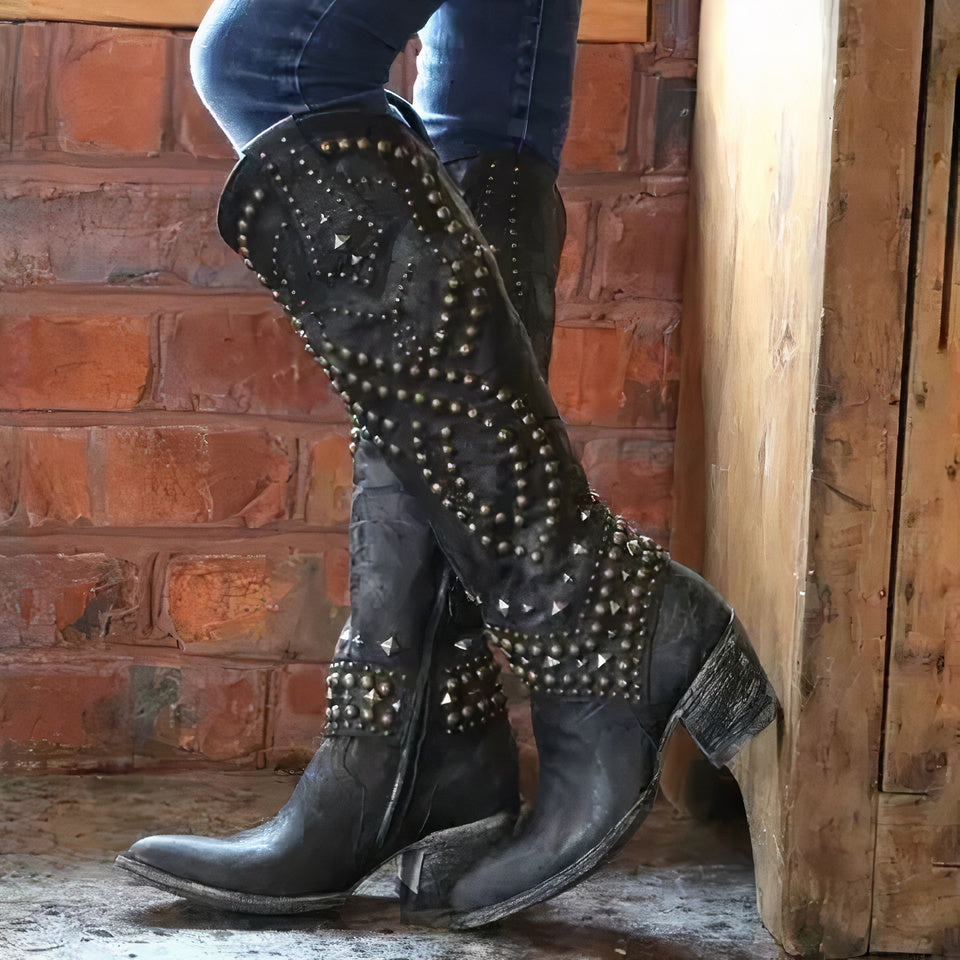 Botas altas hasta la rodilla. Encantadoras.