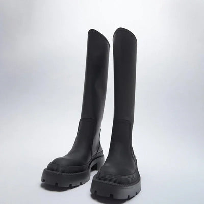 Botas altas, con suela gruesa