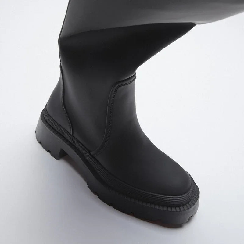 Botas altas, con suela gruesa