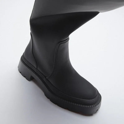 Botas altas, con suela gruesa