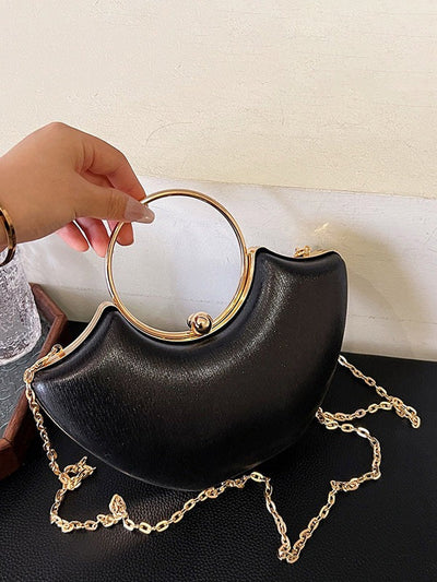 BOLSO DE MANO DORADO METÁLICO CON ASA CIRCULAR