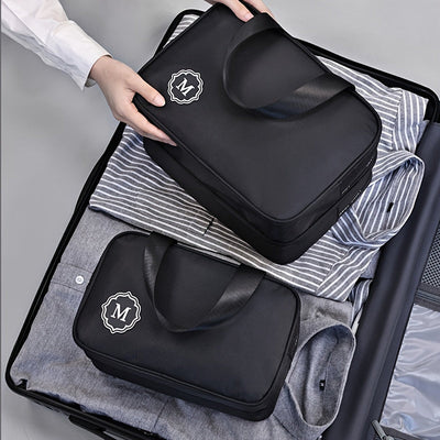 Neceser de viaje con compartimentos múltiples para mujer.