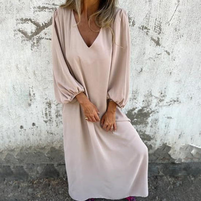 OLGA|Vestido largo fluido con escote en V y mangas abullonadas .