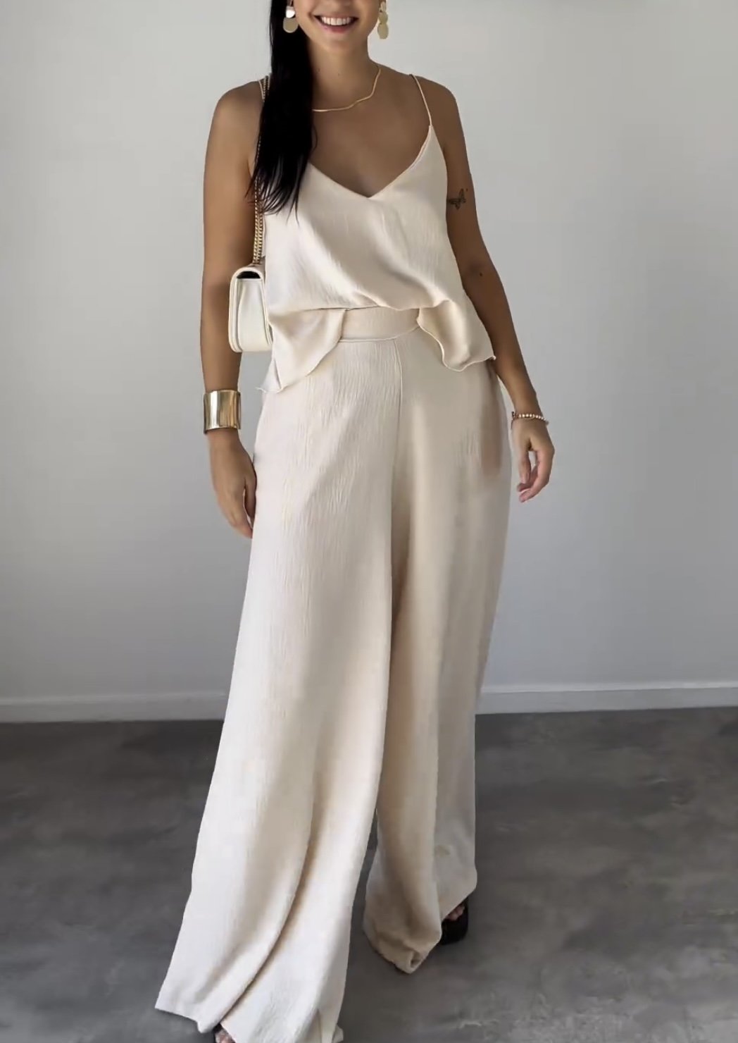 Susan - Estiloso conjunto de top sin mangas y pantalones anchos