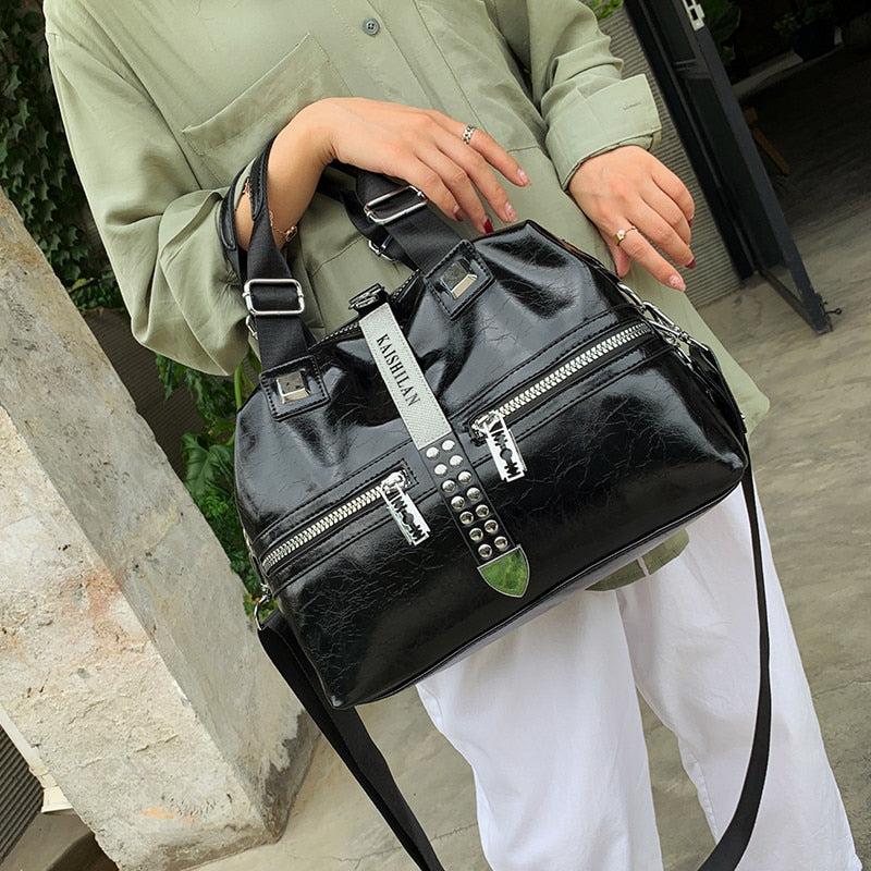 Bolso de cuero con forro de poliester