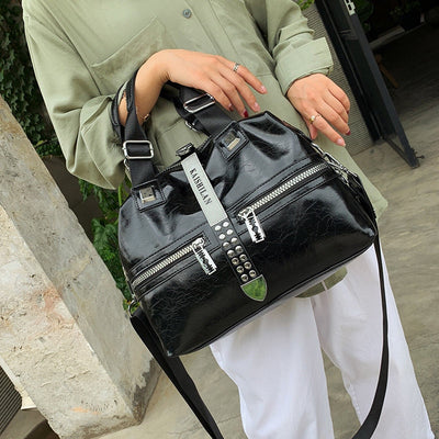 Bolso de cuero con forro de poliester