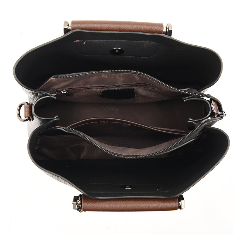 Bolso de cuero auténtico con correa ajustable.